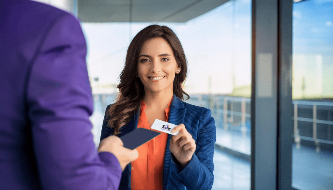 A decorative image of a young professional using an NFC enabled business card meant to conceptualize digital networking skills